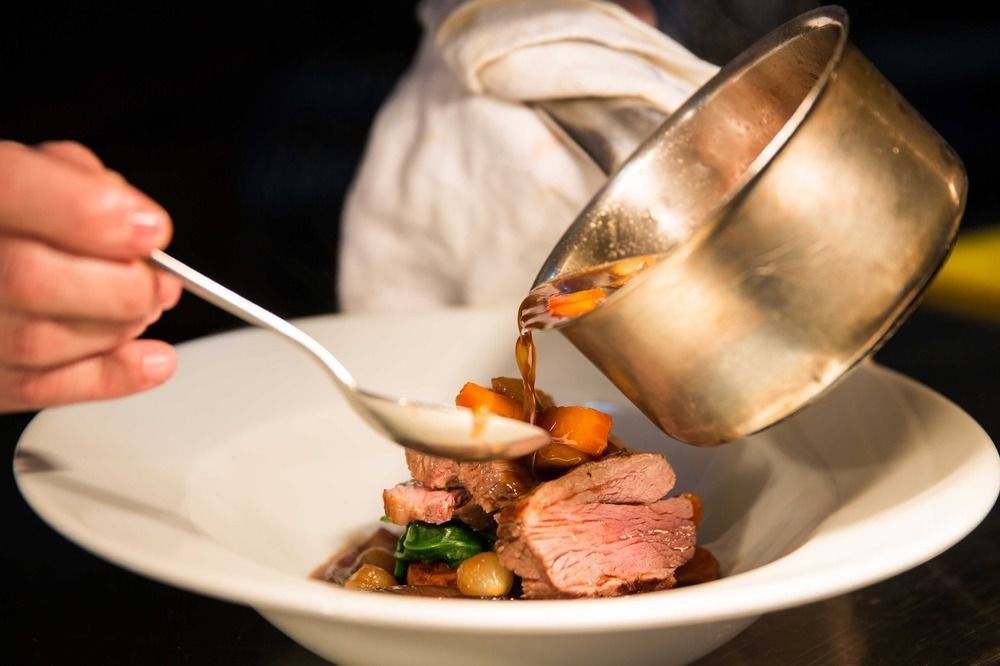 Hotel The Millstone, Mellor Blackburn  Exterior foto A chef plating a dish